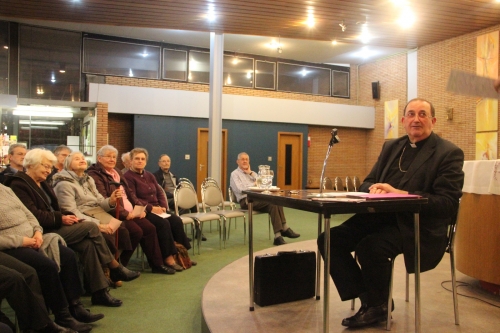Mgr. Guy Harigny, bisschop van Doornik en referent voor de relaties met de islam tijdens een lezing in precoronatijden